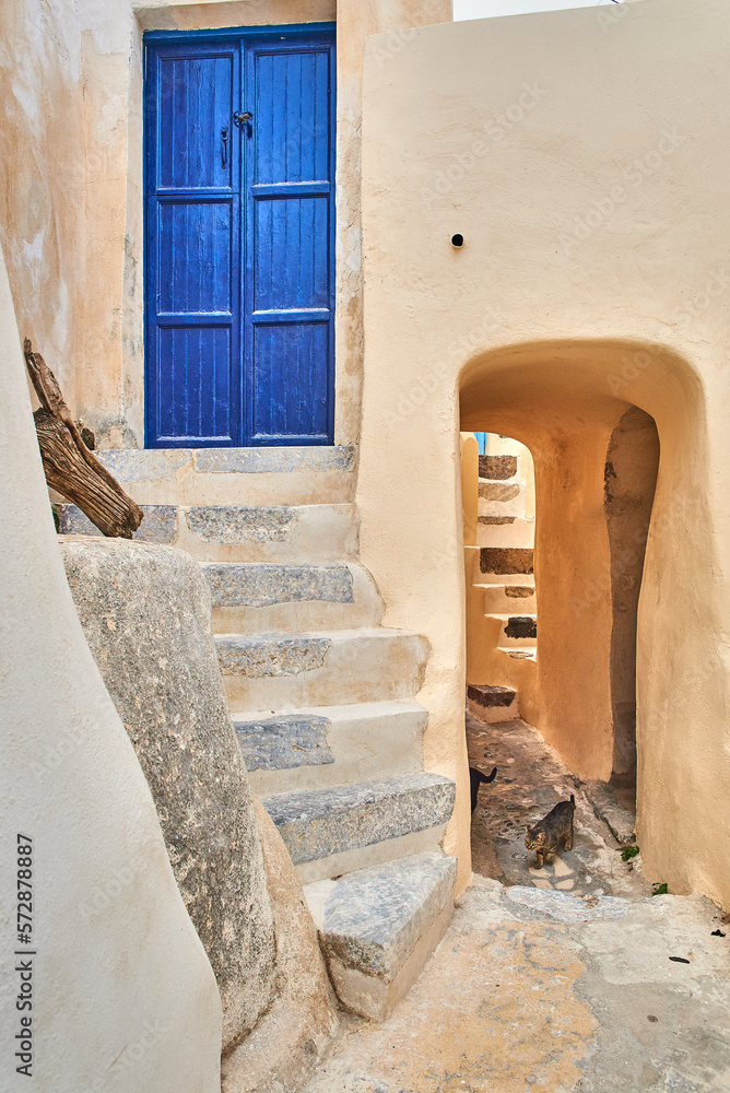Dark Blue front door to a house in an old minimalist Greek village
