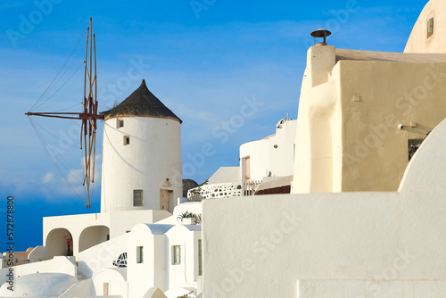 Santorini landscape, sunny day blue sky windmills