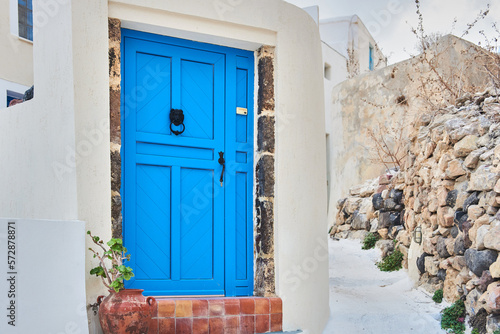 Dark Blue front door to a house in an old minimalist Greek village