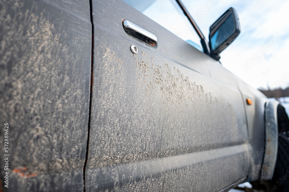 Dirty car side. Splash and texture of mud on a car. Dirty car side. Splash and texture of mud on a car.