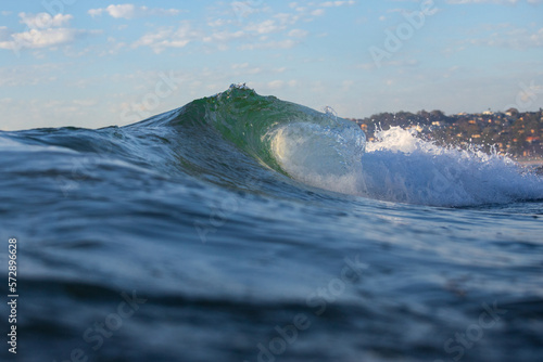 Fototapeta Naklejka Na Ścianę i Meble -  A big wave breaking on the ocean.
