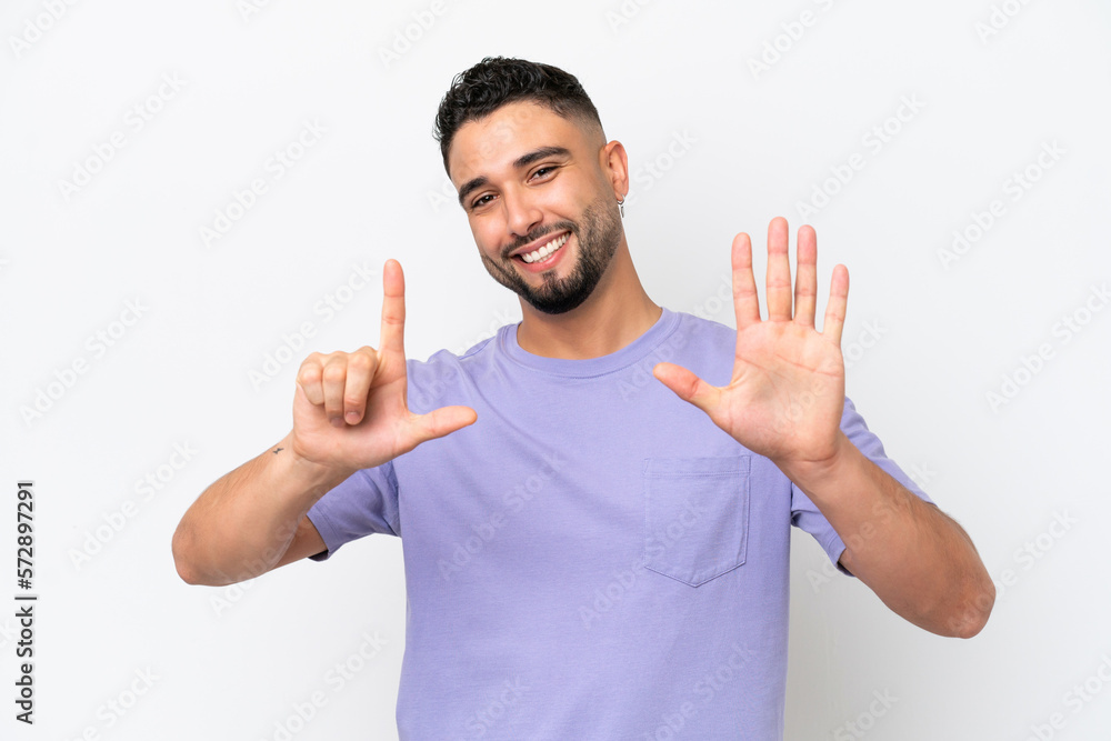 Young Arab handsome man isolated on white background counting seven with fingers Young Arab handsome man isolated on white background counting seven with fingers