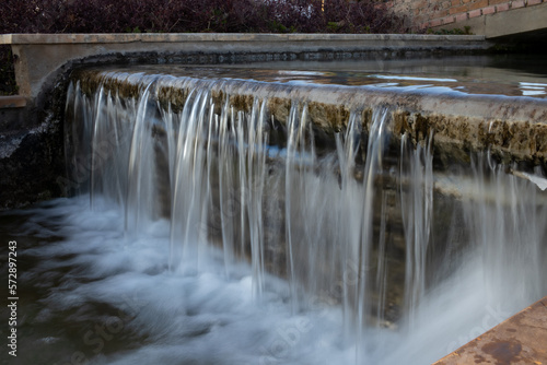 Fototapeta Naklejka Na Ścianę i Meble -  Waterfall in the form of a cascade