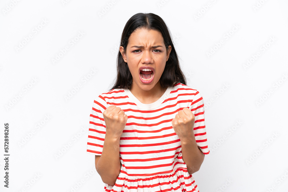 Young Colombian woman isolated on white background frustrated by a bad situation Young Colombian woman isolated on white background frustrated by a bad situation