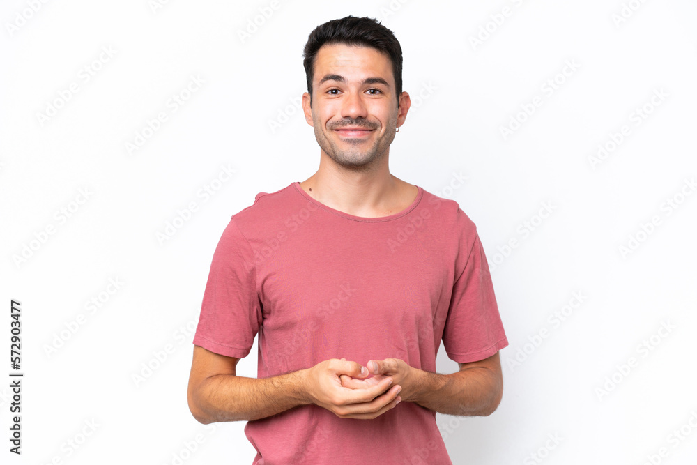 Obraz premium Young handsome man over isolated white background laughing