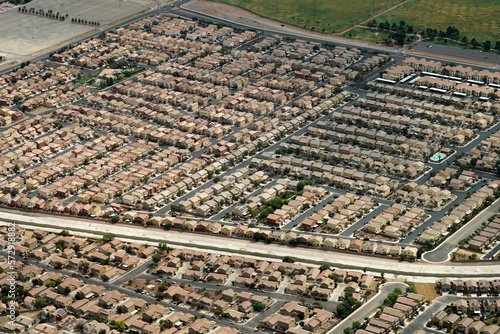 Aerial view of a geometric residential area with bungalows. This suburban housing complex is in a geometrical form.