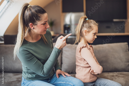 Bilde på lerret Angry mother is scolding at her daughter.