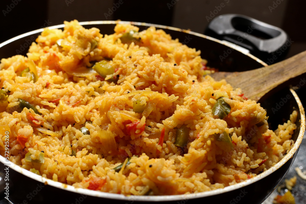 Close-up view of tomato rice cooking, tomato rice home made Close-up view of tomato rice cooking, tomato rice home made