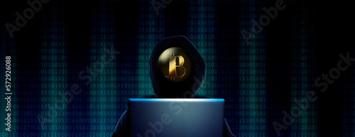 Dunkle Person mit Kapuze als Silhouette vor einem geöffneten Laptop und digit...