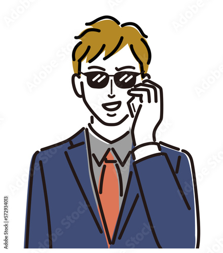 スマホで電話する人相の悪いの男