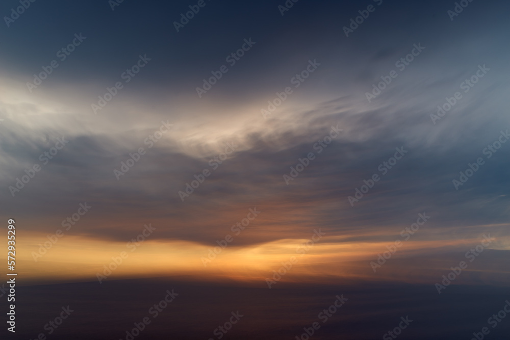 Abstract sunset over the sea with dramatic clouds