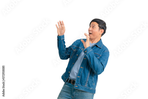 Asian man in jeans doing various poses