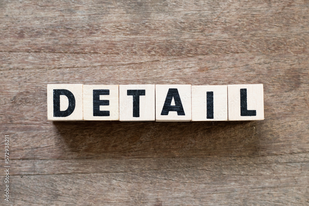 Fototapeta premium Alphabet letter block in word detail on wood background