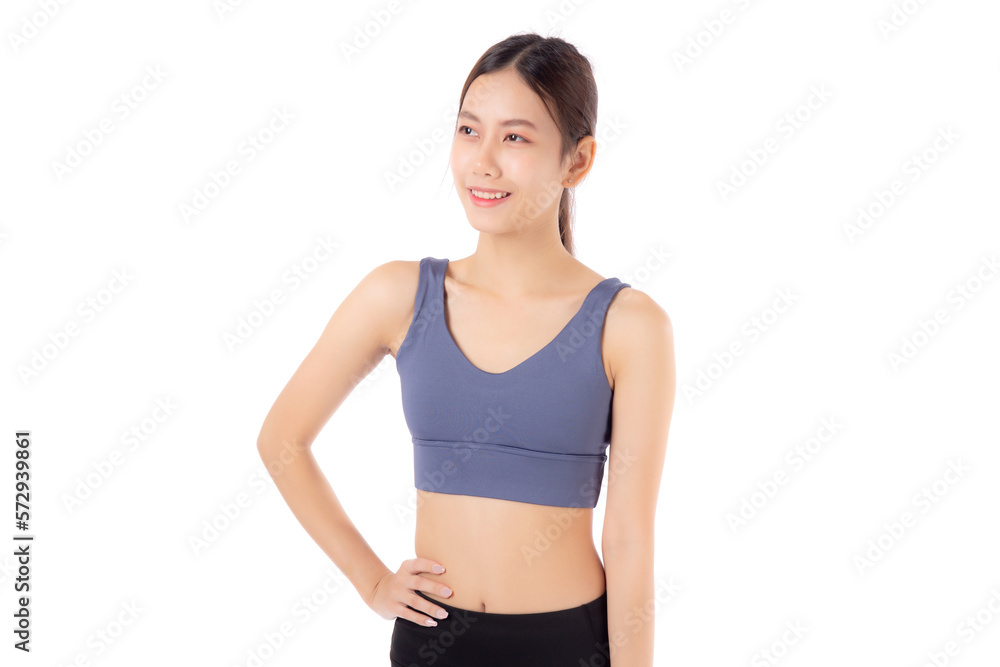 Portrait of beautiful young asian woman in sportwear smile and showing waist and abs isolated on white background, sport and exercise for health, female slimming with confident and wellness Portrait of beautiful young asian woman in sportwear smile and showing waist and abs isolated on white background, sport and exercise for health, female slimming with confident and wellness