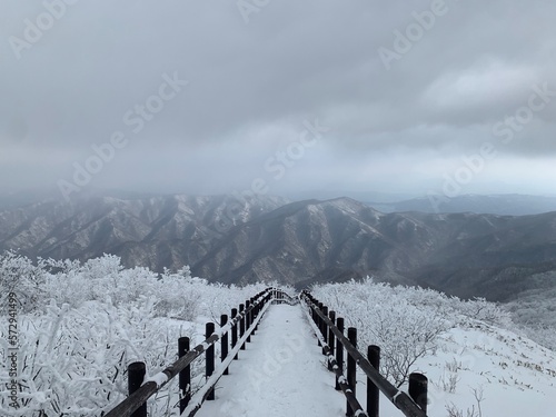 a view from the top of a snowy mountain 1