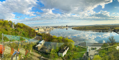 Scenic top panoramic view of Kyiv city Podol old center, Dnepr river Rybalskiy island panoramic landscape. Ukrainian capital Kiev panorama