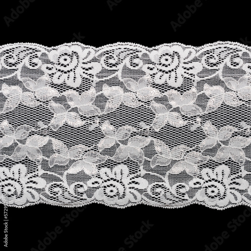 white floral lace isolated on black background