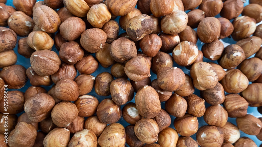 Hazelnut background. Many nuts. Hazelnut without shell Hazelnut background. Many nuts. Hazelnut without shell