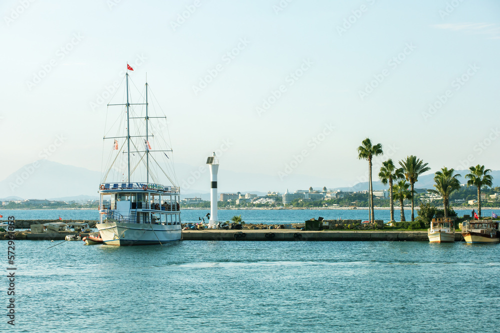 Beautiful view pier in mediterranean resort in Side, Turkey. Concept summer journey vacation.