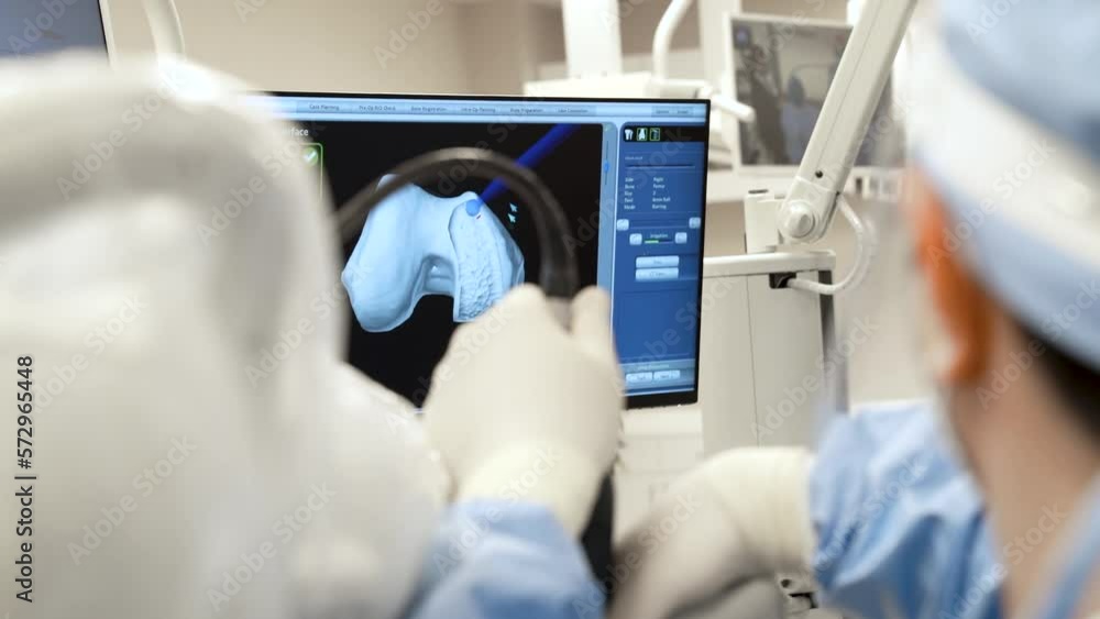 Team of doctor perform total hip arthroplasty replacement surgery in osteoarthritis patient inside the operating room. mako robot-assisted - robotic hip and knee replacement surgery 