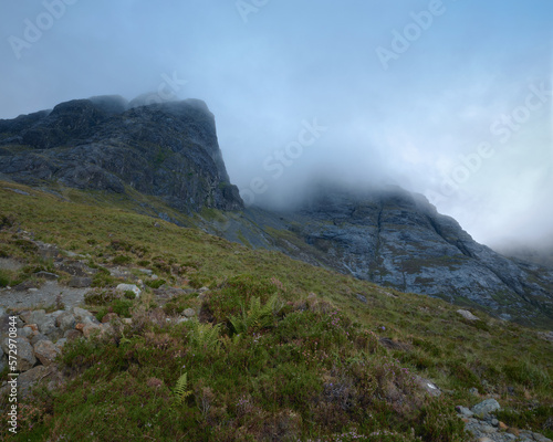 Morning view of cloud covered mountain range. Bla Bheinn, Isle of Skye, Scottish Highlands, UK.
