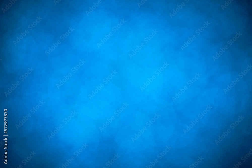 Abstract blue background with vignette.