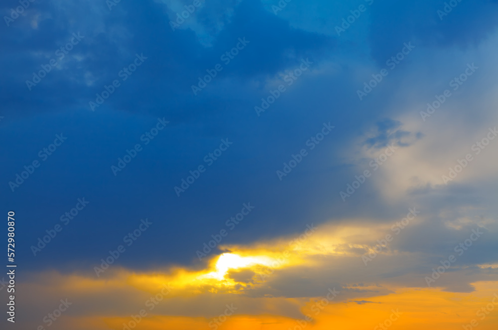 Morning sky with glowing light and clouds