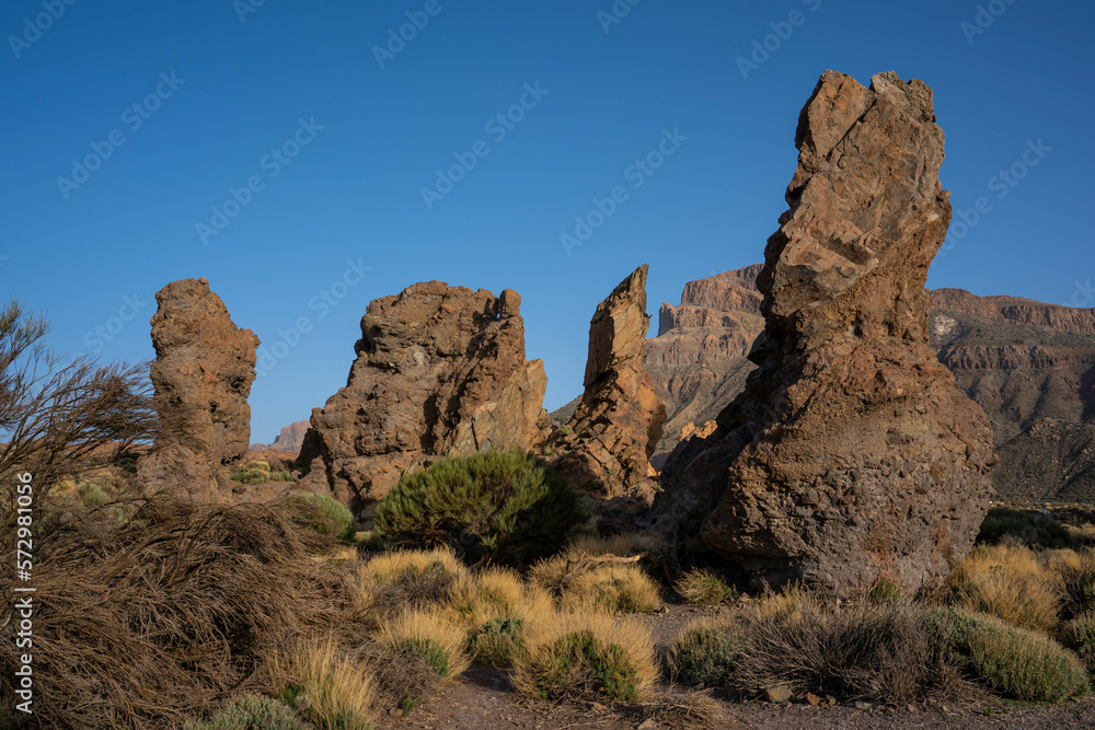 View of Los Roques de Garcia,  Tenerife, Spain, Europe. Rocky mountains with blue sky in the background. 