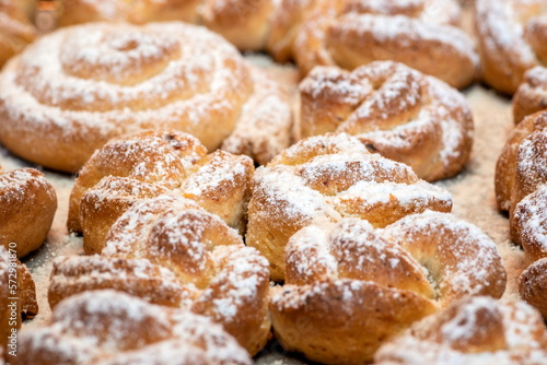 Sweet homemade cakes sprinkled with vanilla sugar. Small cookies