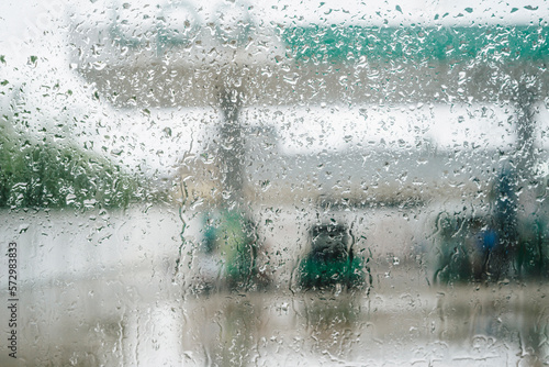 Rain droplets on window with out of focus background