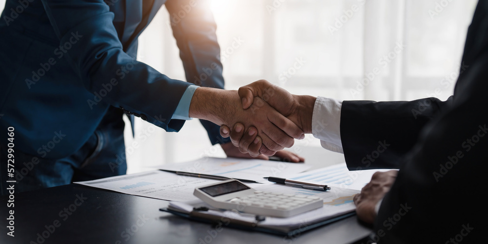 Business handshake for teamwork of business merger and acquisition,successful negotiate,hand shake,two businessman shake hand with partner to celebration partnership and business deal concept. Business handshake for teamwork of business merger and acquisition,successful negotiate,hand shake,two businessman shake hand with partner to celebration partnership and business deal concept.