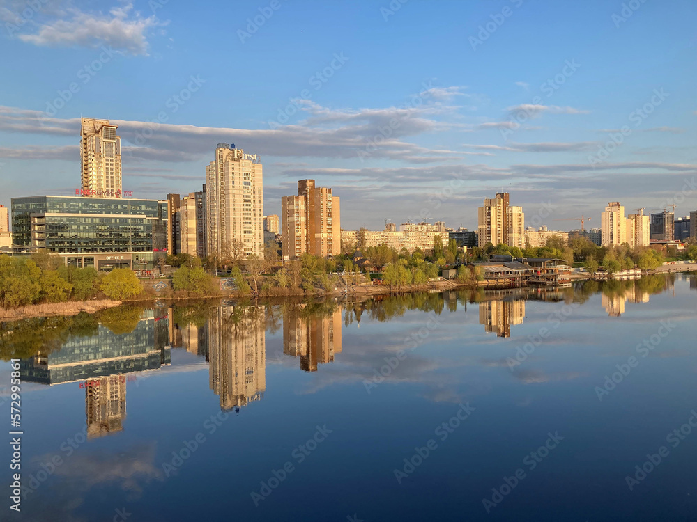 Kiev city bridge over the Dnieper river. Scenic view of the city landscape. The famous bridge. Residential buildings. view to the big river Kiev city bridge over the Dnieper river. Scenic view of the city landscape. The famous bridge. Residential buildings. view to the big river