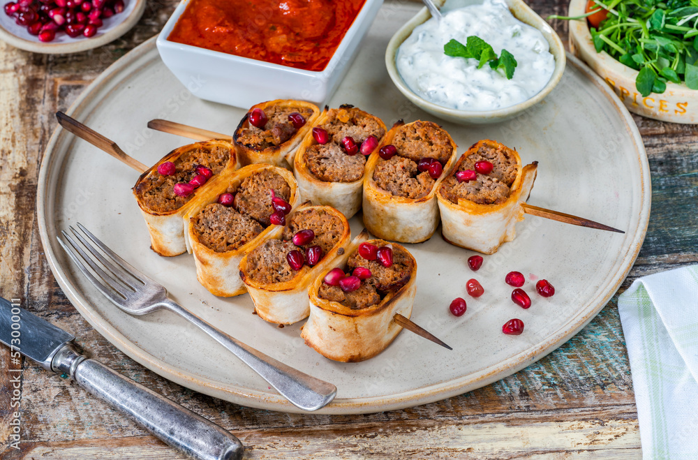Beyti - Turikish lamb kofte-style kebab wrapped in flatbread Beyti - Turikish lamb kofte-style kebab wrapped in flatbread