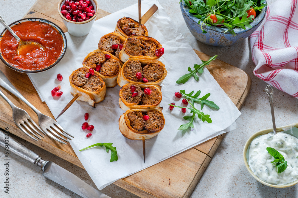 Beyti - Turikish lamb kofte-style kebab wrapped in flatbread Beyti - Turikish lamb kofte-style kebab wrapped in flatbread