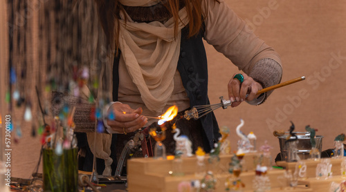 woman creating crafts with crystals