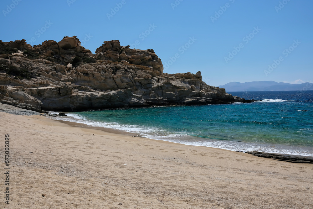 The beautiful turquoise sandy beach of Sapounohoma in Ios Greece