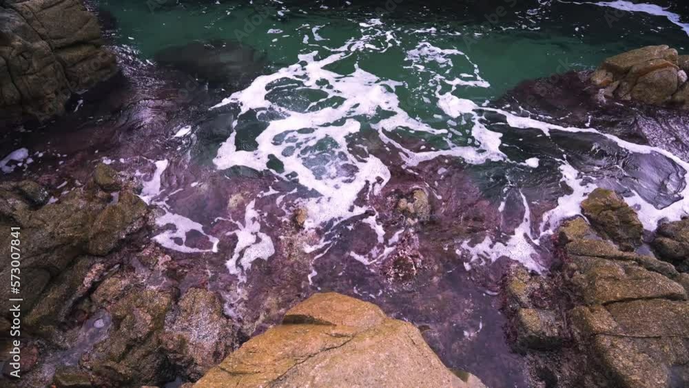 Waves crushing on the coastline stones. Waves crushing on the coastline stones.