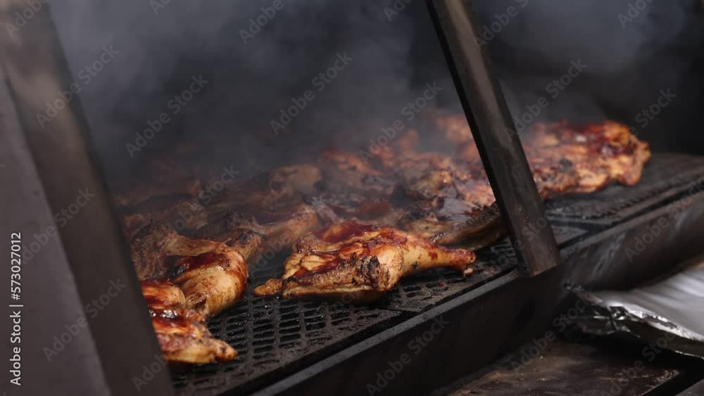 View Of Large Grill Filled With Barbecue Chicken Close Lid View Of Large Grill Filled With Barbecue Chicken Close Lid