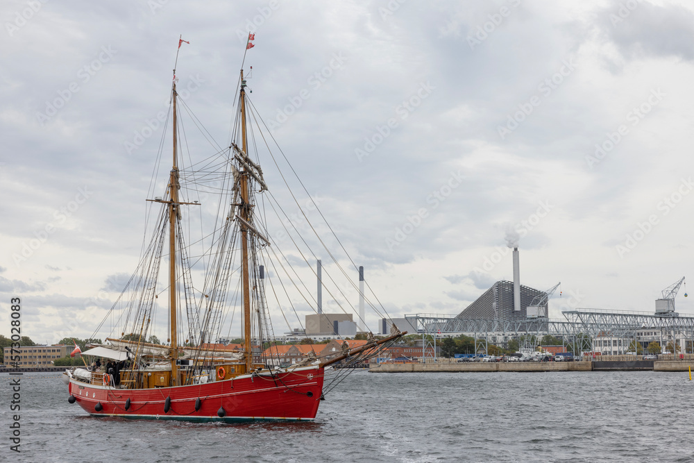 Old sailing boat in Copenhagen with tourists on board for sightseeing,Denmark,Europe Old sailing boat in Copenhagen with tourists on board for sightseeing,Denmark,Europe
