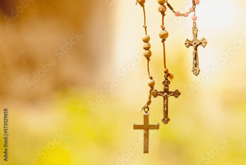 Very old destroyed rosaries as a symbol of salvation and eternal life of human soul. Copy space. © zwiebackesser