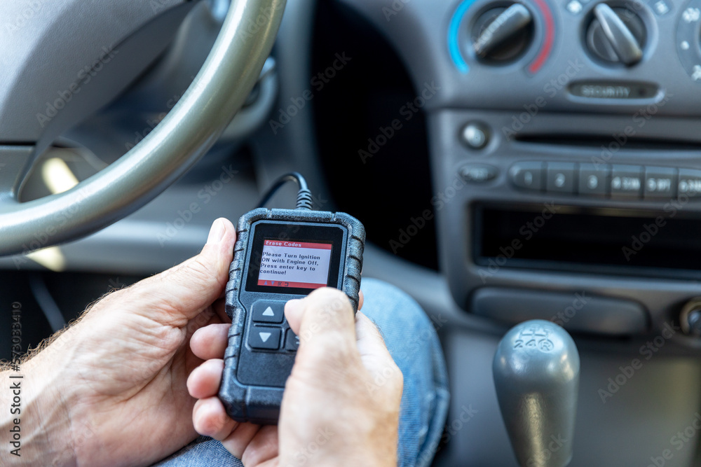Using a car scan code reader for repair diagnostic and check engine test Using a car scan code reader for repair diagnostic and check engine test