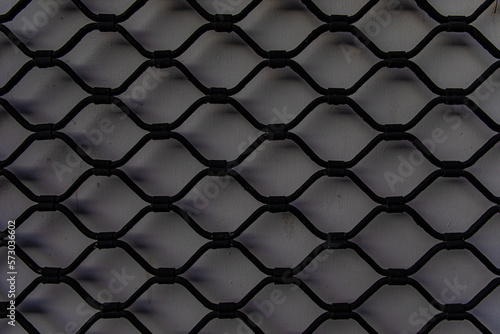black metal grille on a white background