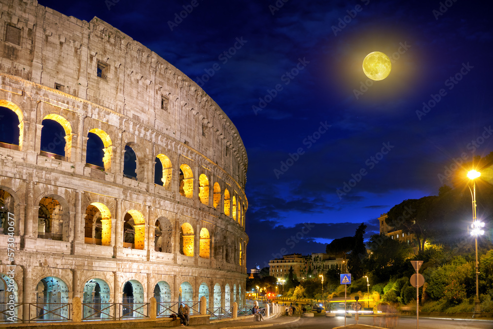Ancient Roman Colosseum in the centre of the city of Rome on a moonlit summer night