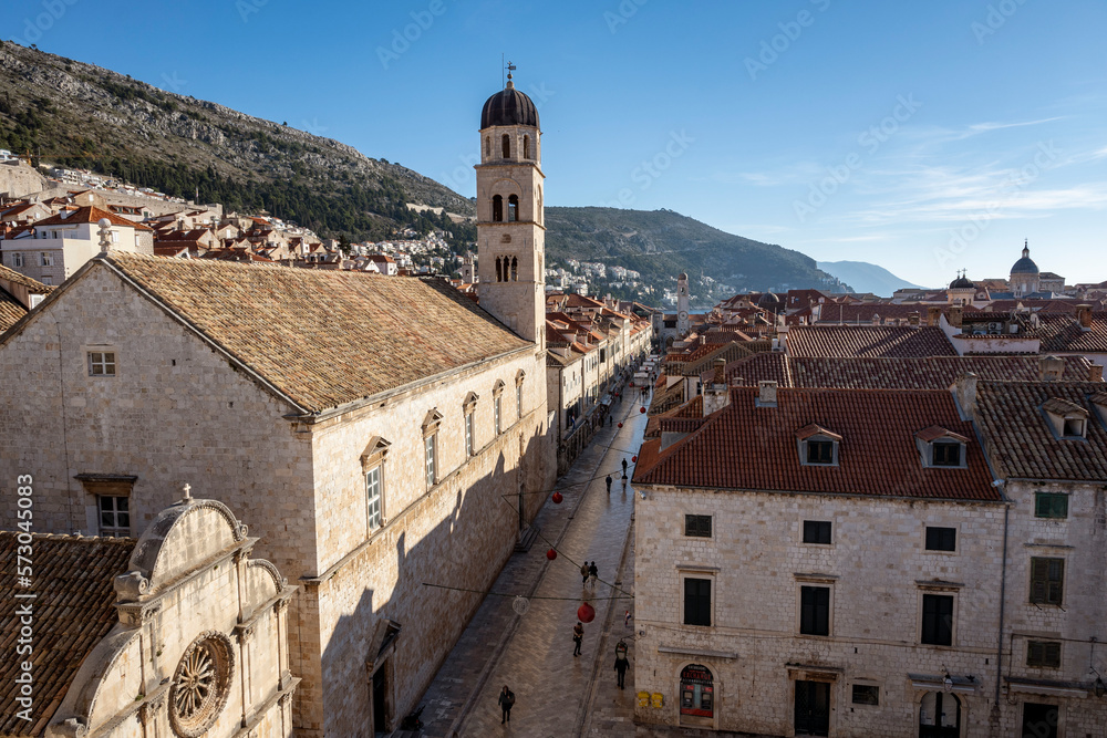 Franciscan Church and Monastery rising above Stradun street in amazing, fortified city of Dubrovnik