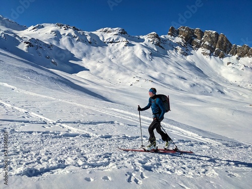 Man on a ski tour. Ski tour in the Flumserberg to the spitzmeilen peak. Beautiful mountains. Ski mountaineering. Skimo skitouring. High quality photo photo