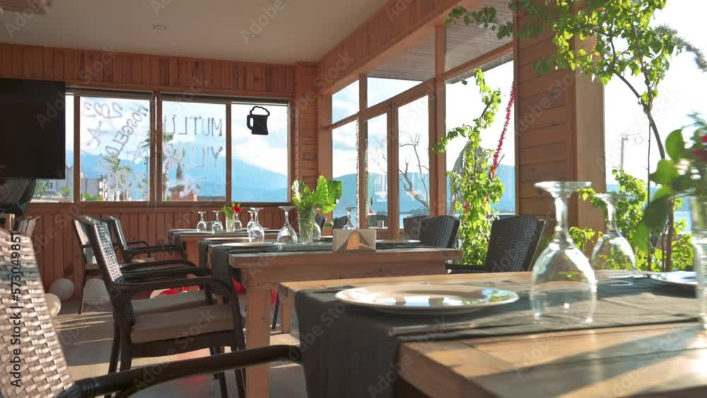 Empty restaurant with reserved table. Inscription reserved on turkish - Rezerve. 4k footage UHD 3840x2160 in slow motion Empty restaurant with reserved table. Inscription reserved on turkish - Rezerve. 4k footage UHD 3840x2160 in slow motion