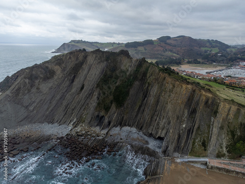 View on steeply-tilted layers of flysch geological formation on Atlantic coast at Zumaia, Basque Country, Spain