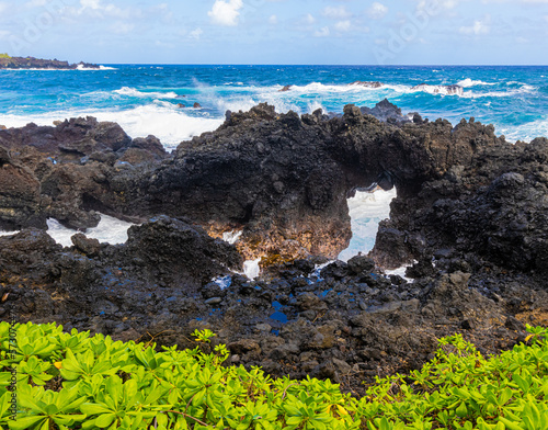 Sea Arch on Lava Coastline Near Kauiau Point, Waianapanapa State Park, Maui, Hawaii, USA photo