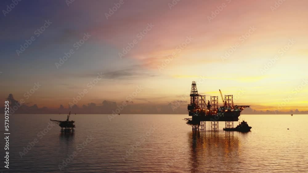 Jack up drilling rig and production platform in the middle of the ocean at sunrise time
Jack up drilling rig and production platform in the middle of the ocean at sunrise time
