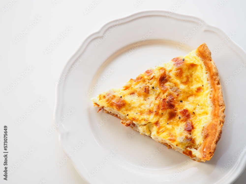 Homemade traditional french Quiche Lorraine, real recipe, white background Homemade traditional french Quiche Lorraine, real recipe, white background